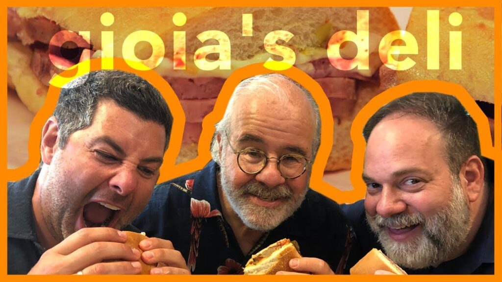 terry andy and ed eat sandwiches at giaias deli