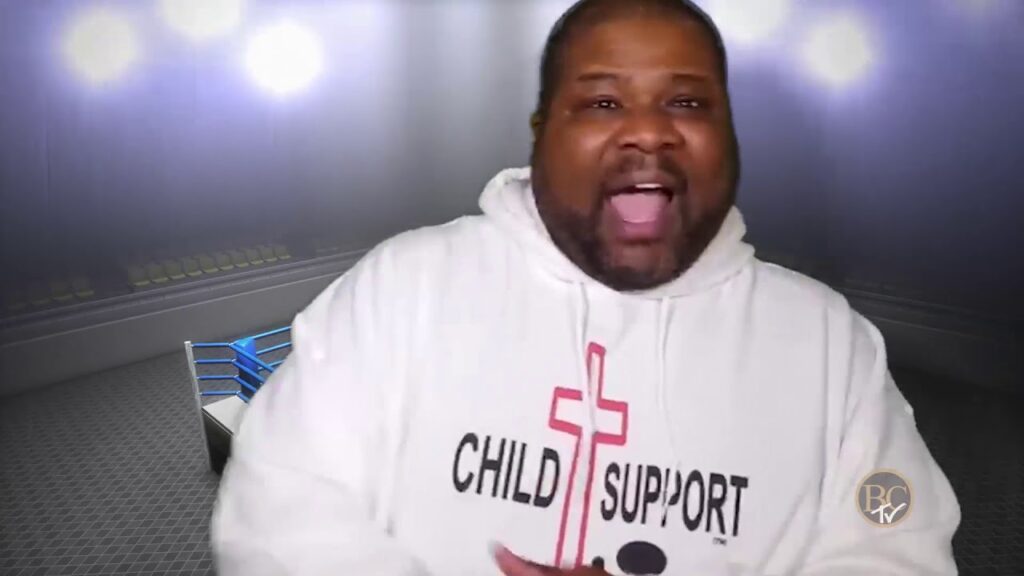 black man in sweatshirt that says child support