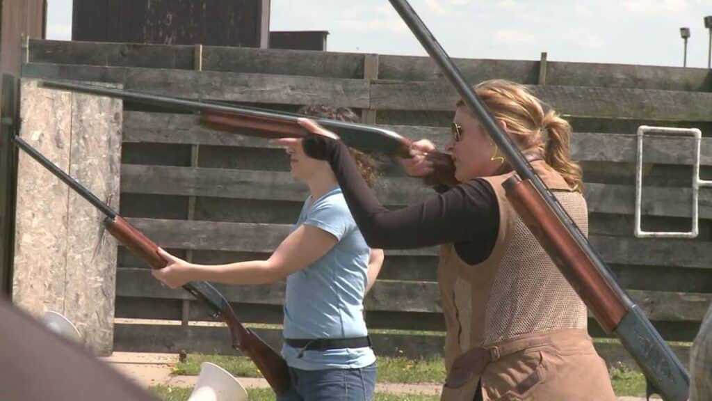 A woman in a shooting lessons