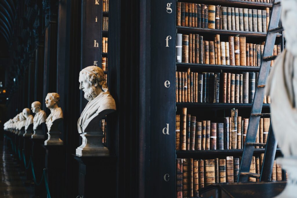 bust statues in a library