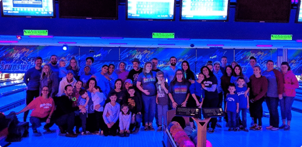 company photo at bowling alley