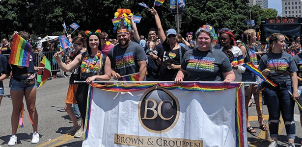 brown and crouppen staff at lgbtq pride parade