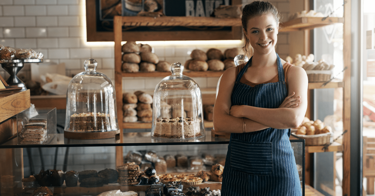 white woman smiling at bakery