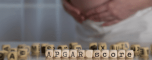 Wooden dice spelling APGAR score