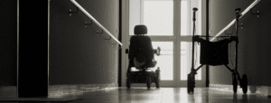 wheel chair in the hallway of a nursing home