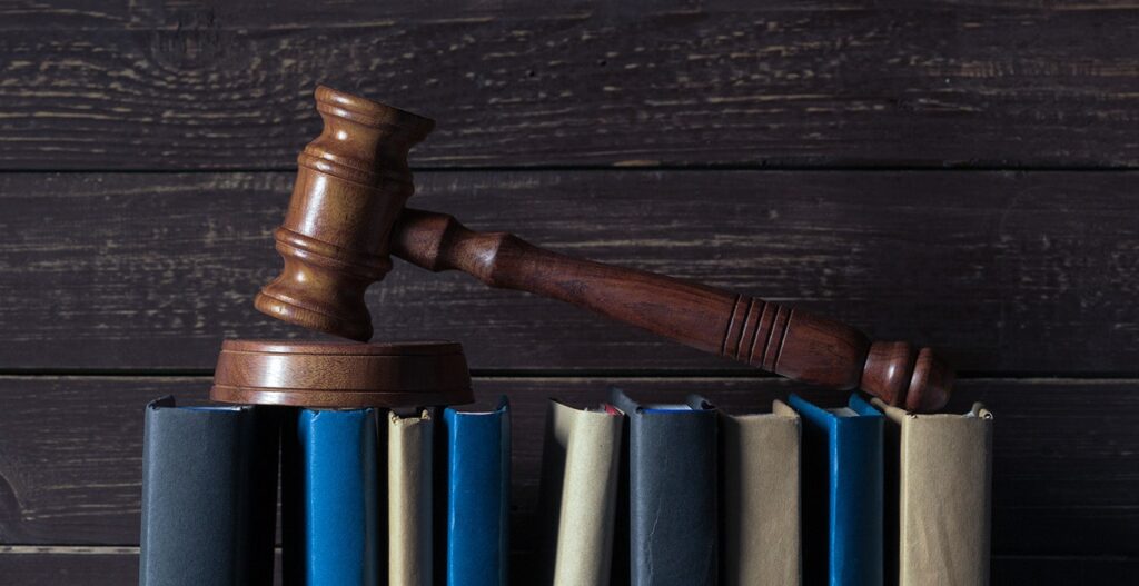 Gavel on top of a row of books