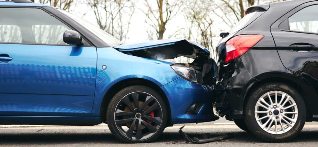 cars colliding in rear end accident
