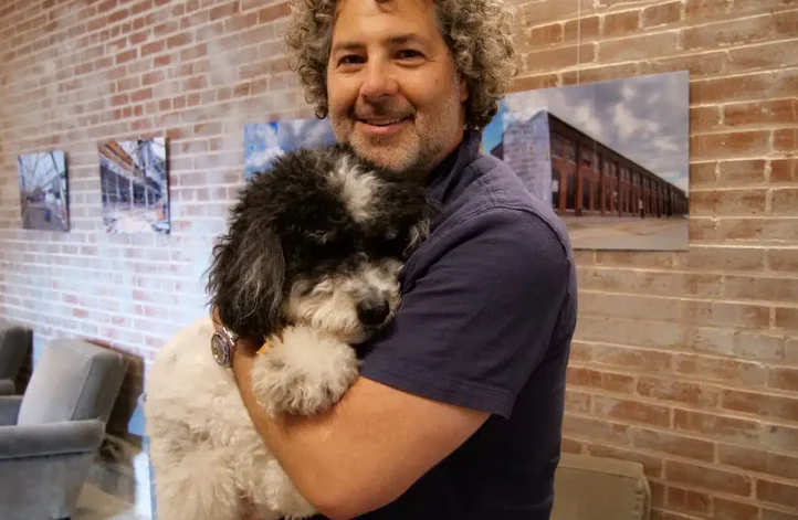 man-holding-dog man-holding-dog